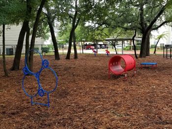 a group of children playing in a park